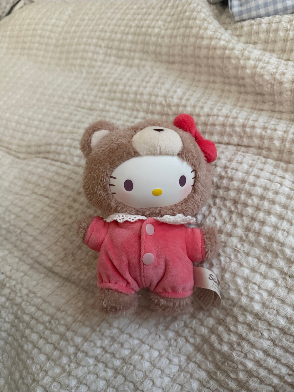Sanrio Hello Kitty Bear Plush in Pink Romper with Red Bow